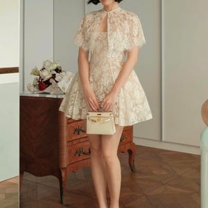 Vintage kanten mini-jurk – Crème A-lijn feestoutfit met pofmouwen afbeelding 2
