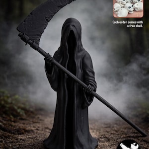 May include: A black Grim Reaper figurine with a scythe, standing on a dirt surface. The figure is cloaked and hooded, with no visible face. The image includes a small graphic that says "Each order comes with a free skull."