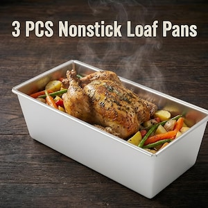 May include: A rectangular, nonstick loaf pan filled with a roasted chicken and vegetables. The chicken is golden brown, and the vegetables include carrots, potatoes, and green beans. The text "3 PCS Nonstick Loaf Pans" is at the top.