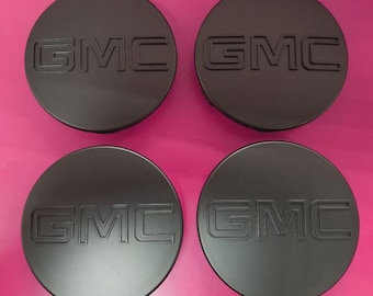 4 tapones centrales negros GMC para llantas de 83 mm (Yukon, Denali, Sierra, 18, 20 y 22 pulgadas).