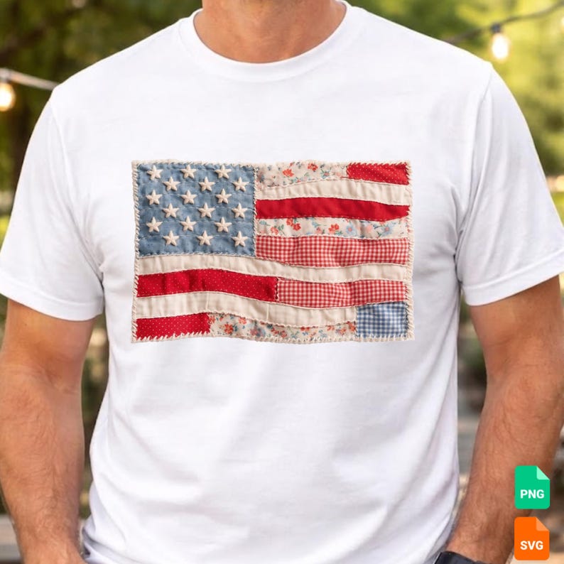 May include: White t-shirt featuring a patchwork American flag design. The flag includes a blue field with white stars, red and white stripes, and floral and gingham patterns. The shirt is a casual, patriotic apparel item.