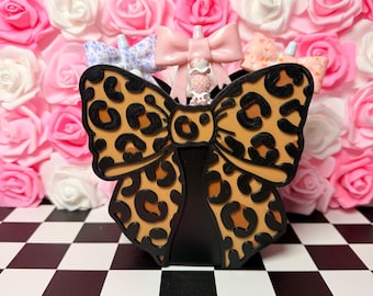 Estuche para bolígrafos con lazo impreso en 3D y estampado de leopardo