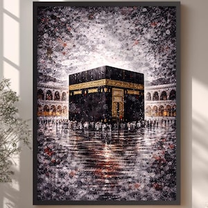 May include: Framed artwork depicting the Kaaba in Mecca, Saudi Arabia. The black cube-shaped structure is surrounded by a crowd of people and reflected in water. The artwork has a dark, textured style with gold accents.