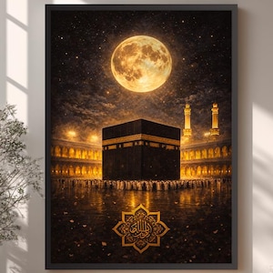 May include: A framed art print depicting the Kaaba in Mecca under a full moon. The artwork features a detailed illustration of the holy site, with golden accents and a starry night sky. The print is displayed in a room with natural light.