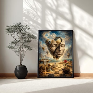 May include: A framed surrealist art print featuring a human face with a staircase inside the head, floating above a landscape with melting clocks and a chess board. A red rose sits on the right. The artwork is displayed next to a potted plant.