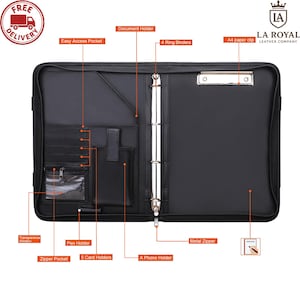 May include: Black leather portfolio with multiple compartments, including a document holder, 4 ring binders, and card slots. Features a metal zipper, pen holder, and a transparent window. The logo "LA ROYAL LEATHER COMPANY" is visible.