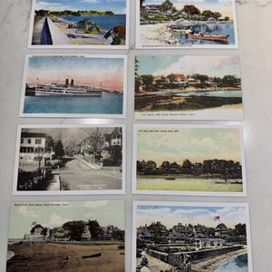 Könnte beinhalten: Eine Sammlung von acht Vintage-Postkarten mit malerischen Ausblicken. Die Postkarten zeigen Küstenlandschaften, darunter Strände, Boote und Gebäude. Jede Postkarte enthält Text mit dem Standort, wie z. B. "Crescent Beach, Play Point, Belle Island, Norwalk, Conn."