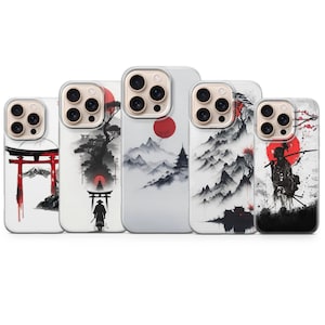 May include: A collection of five phone cases featuring Japanese-inspired art. Each case displays a different design, including a red sun, mountains, temples, and samurai figures. The color palette is primarily black, white, and red.