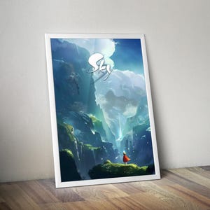 May include: White framed art print featuring a digital painting of a mountainous landscape with a waterfall and a figure in a red cloak. The word "Sky" is written in white script across the top.