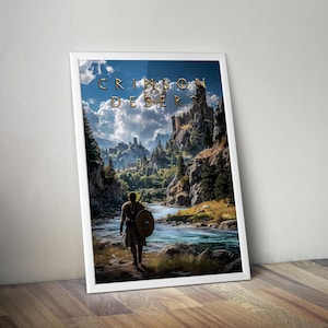 May include: Framed art print featuring a landscape with a figure walking towards a castle. The artwork has a fantasy theme, with a river, mountains, and the text "CRIMSON DESERT" in gold lettering. The sky is blue with white clouds.