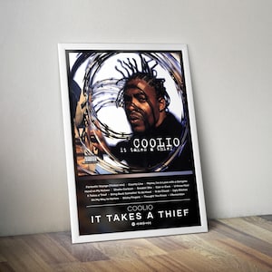 May include: A framed poster featuring Coolio's album "It Takes a Thief." The image shows Coolio's portrait within a barbed wire design. The album title and tracklist are visible in white text against a black background. The poster is leaning against a wooden floor.