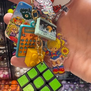 Genx inspired bag charm keychain.