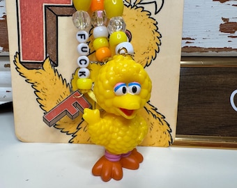 Marcapáginas y dije de Sesame Junk Journal con palabrotas