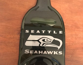 Slumped bottle with team logo