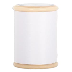 May include: A cylindrical spool of white sewing thread featuring a smooth, uniform texture. The spool has a light beige plastic top and bottom rim, providing a stable structure for the tightly wound white thread that covers the central core.