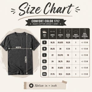 May include: A size chart for a Comfort Color 1717 heavy cotton t-shirt. The image displays a dark grey t-shirt with width and length arrows, alongside a table listing measurements in inches for sizes S through 3XL, including sleeve length and tolerances.