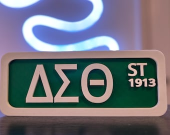 Targa da scrivania a tema segnaletica stradale della Delta Sigma Theta
