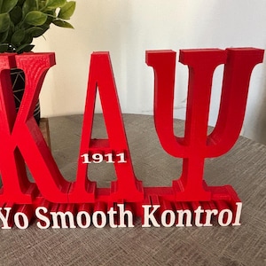 カッパ・アルファ・プサイのデスクサイン