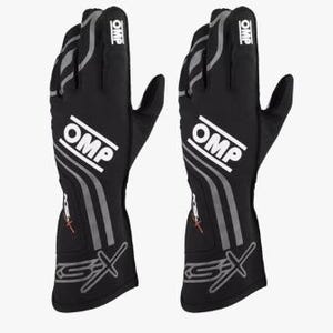 May include: Pair of black OMP racing gloves. The gloves feature white "OMP" logos, gray accents, and "GS-X" branding. The gloves are designed for motorsports and offer a professional look.
