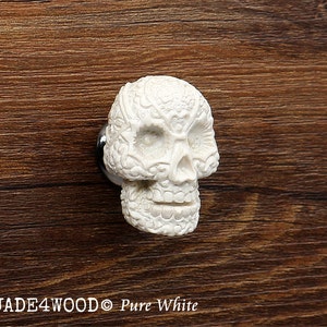 Puede incluir: Pomo de armario blanco en forma de calavera con una superficie texturizada detallada. JADE4WOOD Pure White.