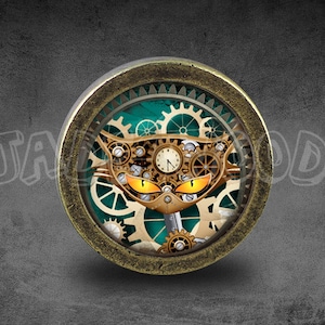 May include: A round, brass-colored pendant with a steampunk design featuring a cat's face made of gears and a clock face. The cat's eyes are glowing orange.