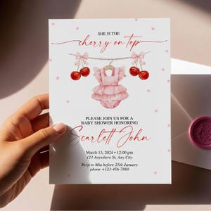 May include: A baby shower invitation with the text "She is the cherry on top." The invitation features a pink watercolor design with cherries, a baby dress, and the name "Scarlett John."