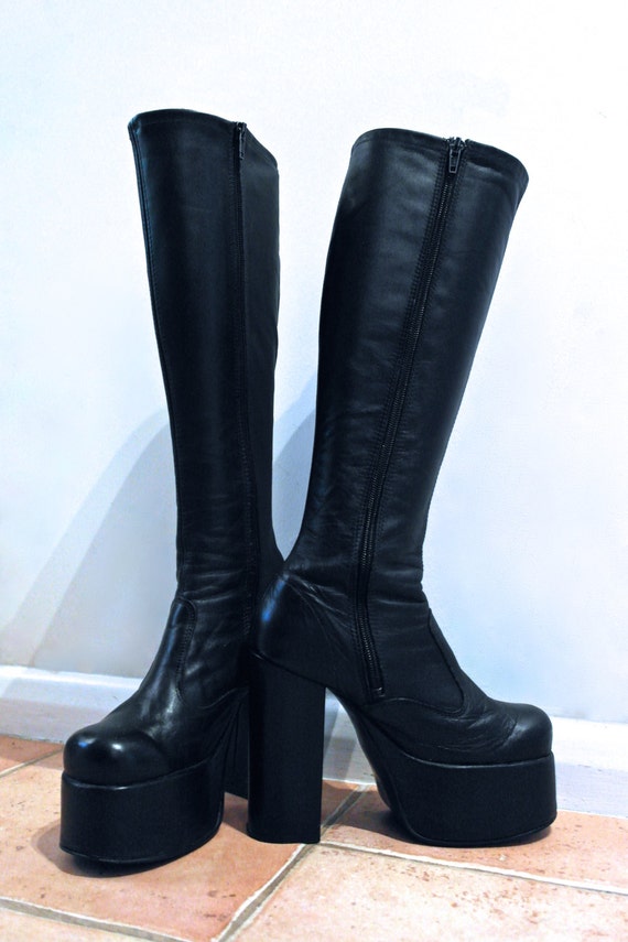 skin tight black knee high boots