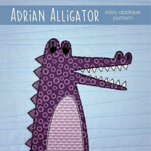 May include: An applique pattern for a purple alligator named Adrian. The pattern is easy to follow and includes a variety of fun details, like a toothy grin and a patterned body. The pattern is perfect for adding a whimsical touch to any project.