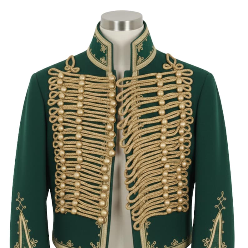 May include: A dark green jacket with gold-colored rope detailing and gold button accents. The jacket has a high collar and gold embroidery along the edges. The jacket is displayed on a mannequin.