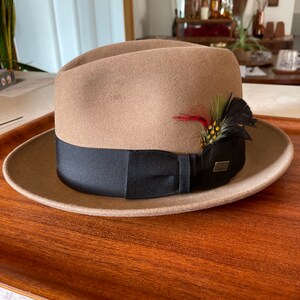 Vintage Dobb’s Daily Fedora in Cornhil Camel Color, size 7, with 1 7/8 inch brim. Brim flip up or down.