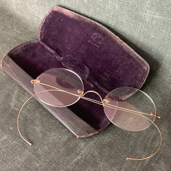 Antique 12k Gold Filled oval wire rim glasses, saddle bridge, flexible cable temples by Steven’s & Co. SQ with original case