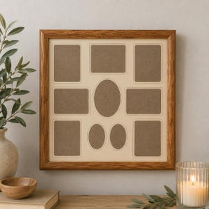 May include: A square collage picture frame with a medium brown wood grain finish. The frame features a cream-coloured mat board with ten openings for photographs, including six rectangular, one large central oval, and two small oval slots.