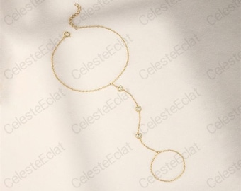 Pulsera minimalista de moissanita con forma de corazón de cristal en oro de 18 quilates.