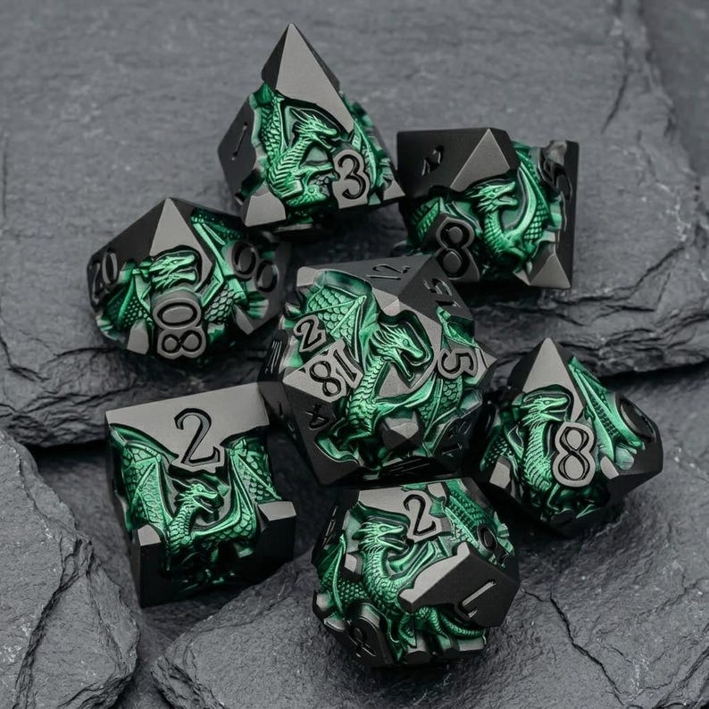May include: A set of seven polyhedral dice featuring a matte black finish with intricate, raised metallic green dragon motifs on each face. The numbers are clearly engraved in a bold, black font, contrasting against the vibrant green dragon artwork.