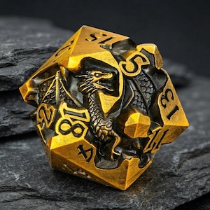 May include: A twenty-sided die featuring a metallic gold finish with black recessed areas. The surface is intricately sculpted with a dragon motif, and the numbers are engraved in a bold, black font across the various triangular faces.