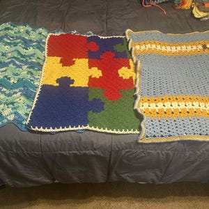 Lot of 3 Crochet Throw Blankets cat/puzzle/multi color