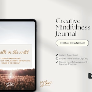 May include: A digital download titled "Creative Mindfulness Journal." The image shows a tablet displaying a journal cover with the text "A walk in the wild." Additional text includes "A guided creative process" and "Digital Download."