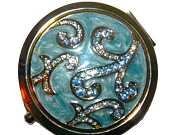 Espejo compacto vintage azul con pedrería y esmalte, con diseño en espiral, de Argento SC.