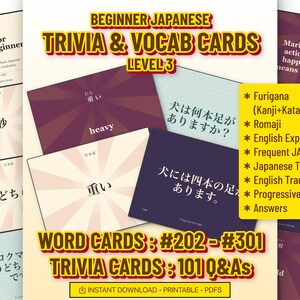 May include: A set of Beginner Japanese trivia and vocabulary cards, level 3, featuring word cards #202-#301 and 101 trivia questions and answers. The cards display Japanese text, furigana, romaji, and English translations on various colored backgrounds.