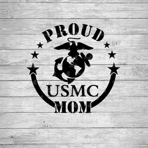 May include: A black vinyl decal featuring the text PROUD USMC MOM arranged in a circular design. The center displays the United States Marine Corps Eagle, Globe, and Anchor emblem. Four five-pointed stars are positioned along the circular border.