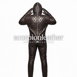 May include: A dark brown quilted leather full-body suit with an attached hood and integrated gloves. The garment features a prominent silver-toned front zipper closure that extends from the hood to the waist, accented with a small padlock. Text reads scorpionleather.