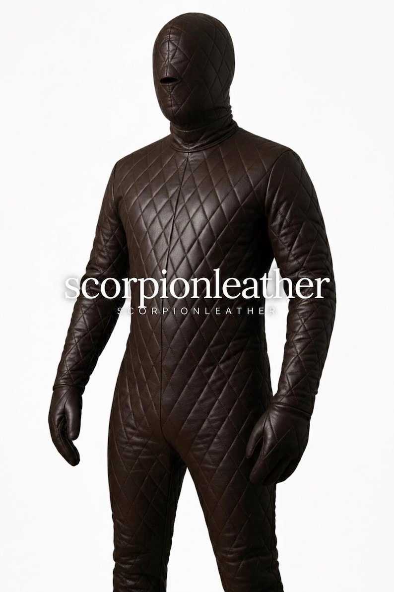 May include: A dark brown full-body suit featuring a quilted diamond pattern throughout the entire garment. The suit includes an integrated hood with a single horizontal eye slit and matching gloves. The text scorpionleather is visible.