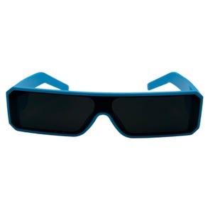 May include: Blue sunglasses with a rectangular black frame and dark lenses. The sunglasses have a modern, angular design. The arms and frame are a bright, solid blue color.