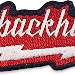 May include: Embroidered patch with the phrase "Mybackhurts" in white script lettering on a red background. A white lightning bolt graphic is below the text, with a navy blue border.