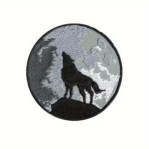 May include: Embroidered patch featuring a black wolf howling at a gray moon. The wolf stands on a black rock, set against a backdrop of a cloudy, gray sky. The patch is circular with a black border.