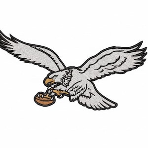 May include: Embroidered patch featuring a white eagle with outstretched wings, holding a brown football in its talons. The eagle has black outlines and a detailed design, perfect for sports fans.