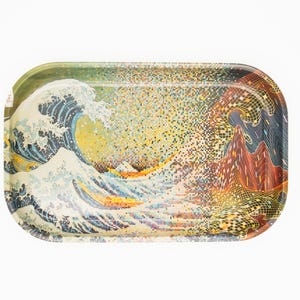 May include: Rectangular metal tray featuring a colorful depiction of Hokusai's "The Great Wave off Kanagawa." The design includes a large wave, boats, and a mountain in the background. The tray has a glossy finish and is set against a white background.