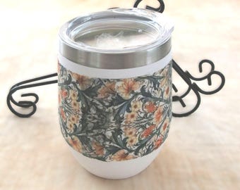 Vibrant colors,12oz stainless tumbler,floral,cotton fabric,decoupage,thermal beverage holder,comfortable grip,rounded shape,clear lid,travel