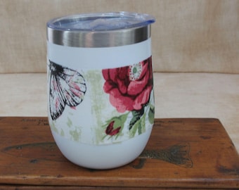 Vibrant colors,12oz stainless tumbler,floral,cotton fabric,decoupage,thermal beverage holder,comfortable grip,rounded shape,clear lid,travel