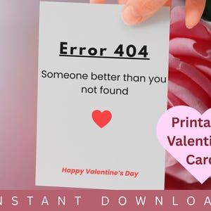 May include: A white Valentine's Day card with the text "Error 404: Someone better than you not found" and a red heart. The card is held by a hand and has "Happy Valentine's Day" printed at the bottom.